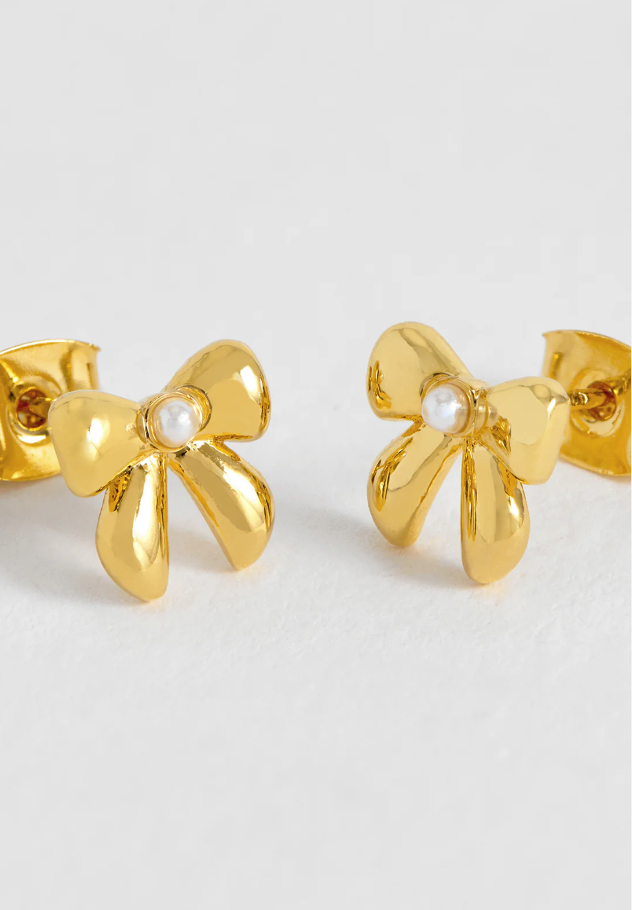 Estella Bartlett Pearl Bow Studs Gold